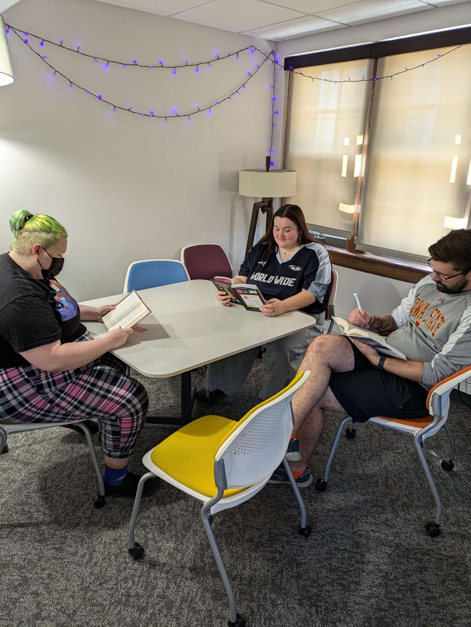 students reading and chatting in the quiet room